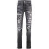 logo-print ripped skinny jeans Amiri