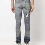 Varsity Ripped Skinny Jeans Amiri