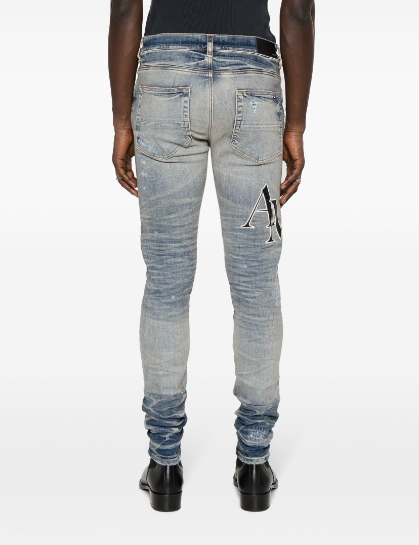 Logo-Patch Cotton-Blend Slim-Fit Jeans - Tha Plug ZA