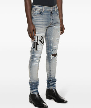 Logo-Patch Cotton-Blend Slim-Fit Jeans - Tha Plug ZA